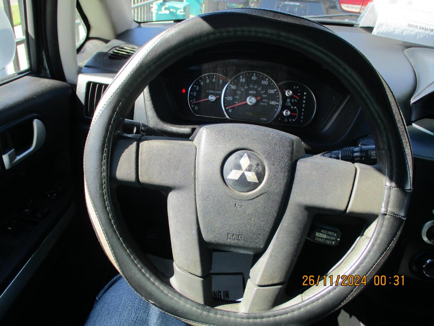 2011 WHITE Mitsubishi Endeavor LS AWD (4A4JN2AS2BE) with an 3.8L V6 SOHC 24V engine, 4-Speed Automatic transmission, located at 2001 E. Lancaster, Ft. Worth, 76103, (817) 336-7000, 32.746181, -97.301018 - Photo#11