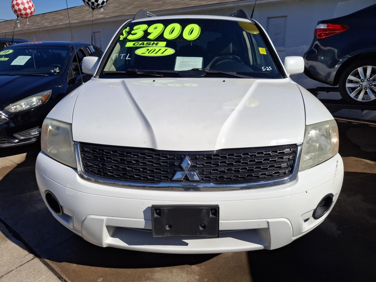 2011 WHITE Mitsubishi Endeavor LS AWD (4A4JN2AS2BE) with an 3.8L V6 SOHC 24V engine, 4-Speed Automatic transmission, located at 2001 E. Lancaster, Ft. Worth, 76103, (817) 336-7000, 32.746181, -97.301018 - Photo#3