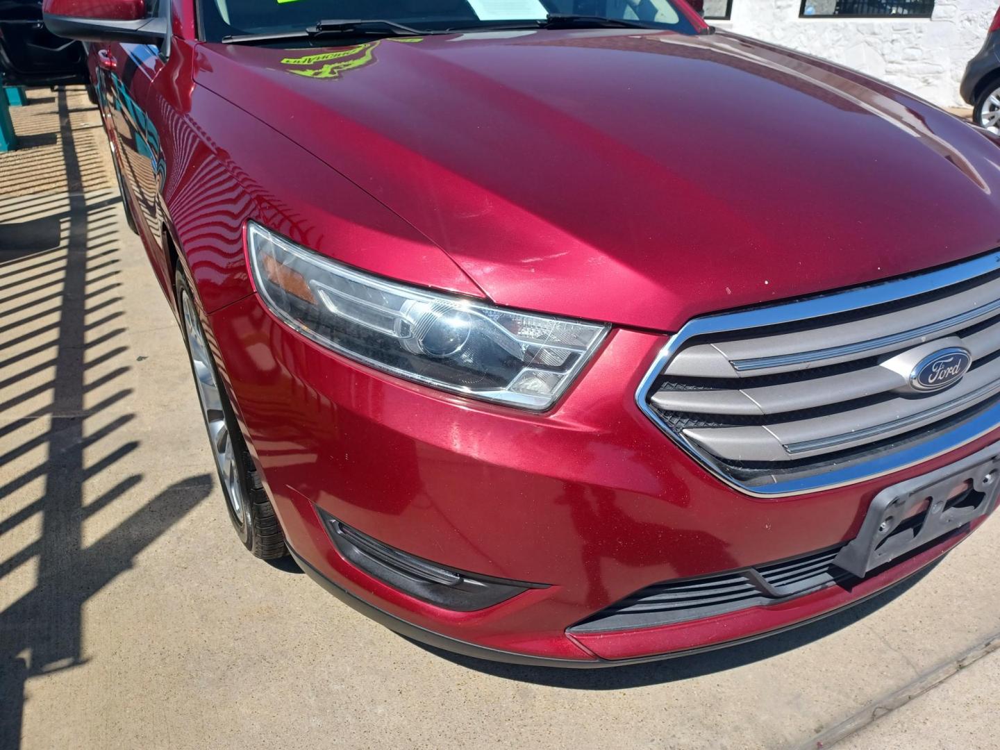 2016 RED /TAN, LEATHER Ford Taurus SEL FWD (1FAHP2E94GG) with an 2.0L L4 DOHC 16V engine, 6A transmission, located at 2001 E. Lancaster, Ft. Worth, 76103, (817) 336-7000, 32.746181, -97.301018 - Photo#2