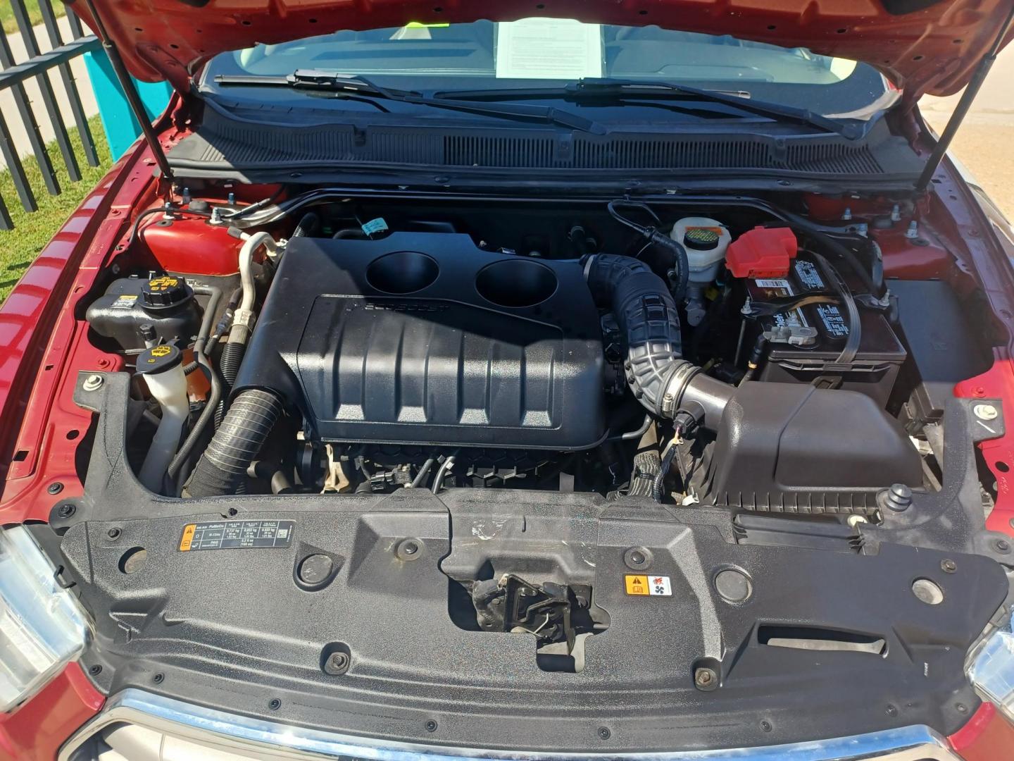 2016 RED /TAN, LEATHER Ford Taurus SEL FWD (1FAHP2E94GG) with an 2.0L L4 DOHC 16V engine, 6A transmission, located at 2001 E. Lancaster, Ft. Worth, 76103, (817) 336-7000, 32.746181, -97.301018 - Photo#23