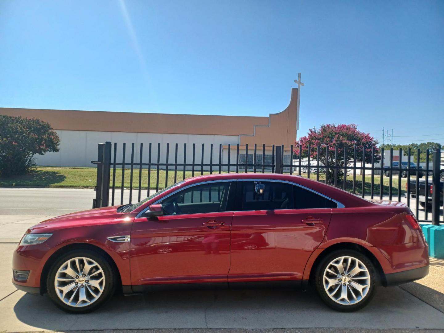 2016 RED /TAN, LEATHER Ford Taurus SEL FWD (1FAHP2E94GG) with an 2.0L L4 DOHC 16V engine, 6A transmission, located at 2001 E. Lancaster, Ft. Worth, 76103, (817) 336-7000, 32.746181, -97.301018 - Photo#0